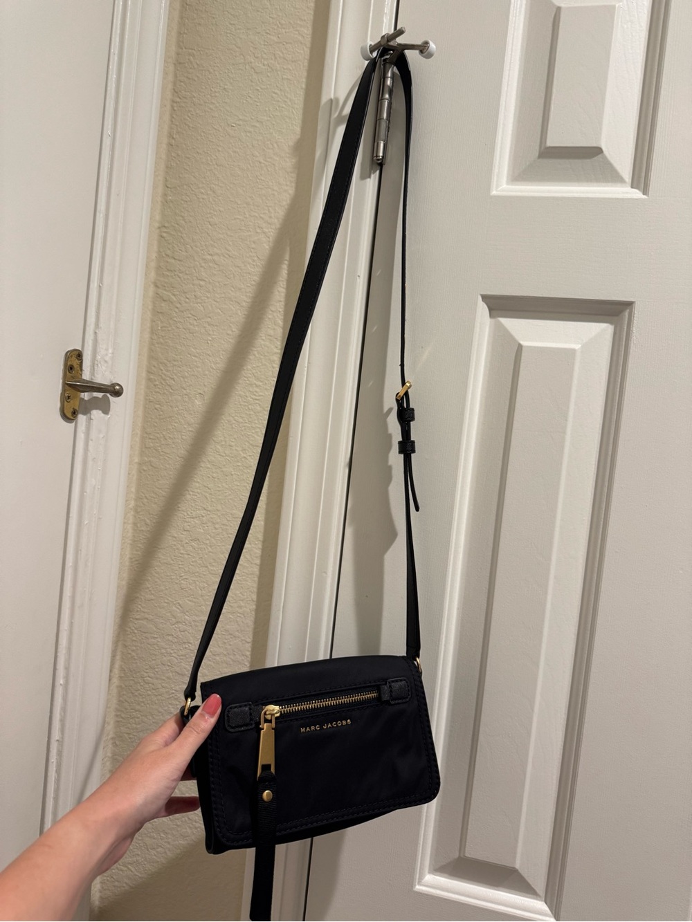 Marc Jacobs Black Crossbody Bag with Gold Hardware Accents